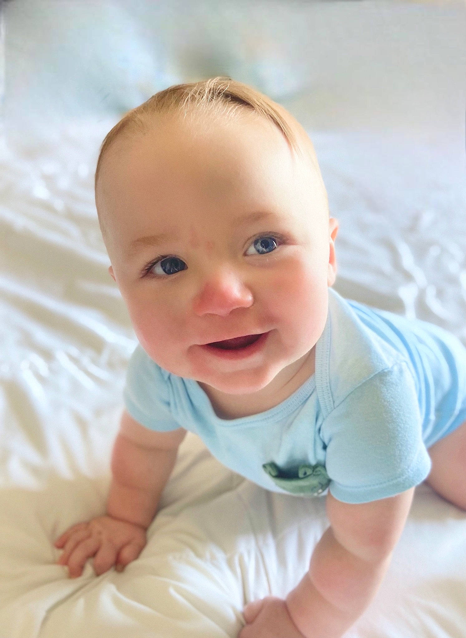 Levi is registered to the contest to win money with this photo: baby, baby_toddler_clothing, cheek, child, comfort, eye, finger, flash_photography, floor, flooring, fun, happy, head, iris, person, sitting, skin, sleeve, smile, toddler