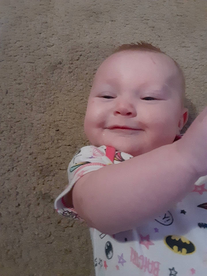 Shay is registered to the contest to win money with this photo: baby, cheek, child, chin, eye, face, finger, head, joy, lip, mouth, nose, person, pink, skin, toddler