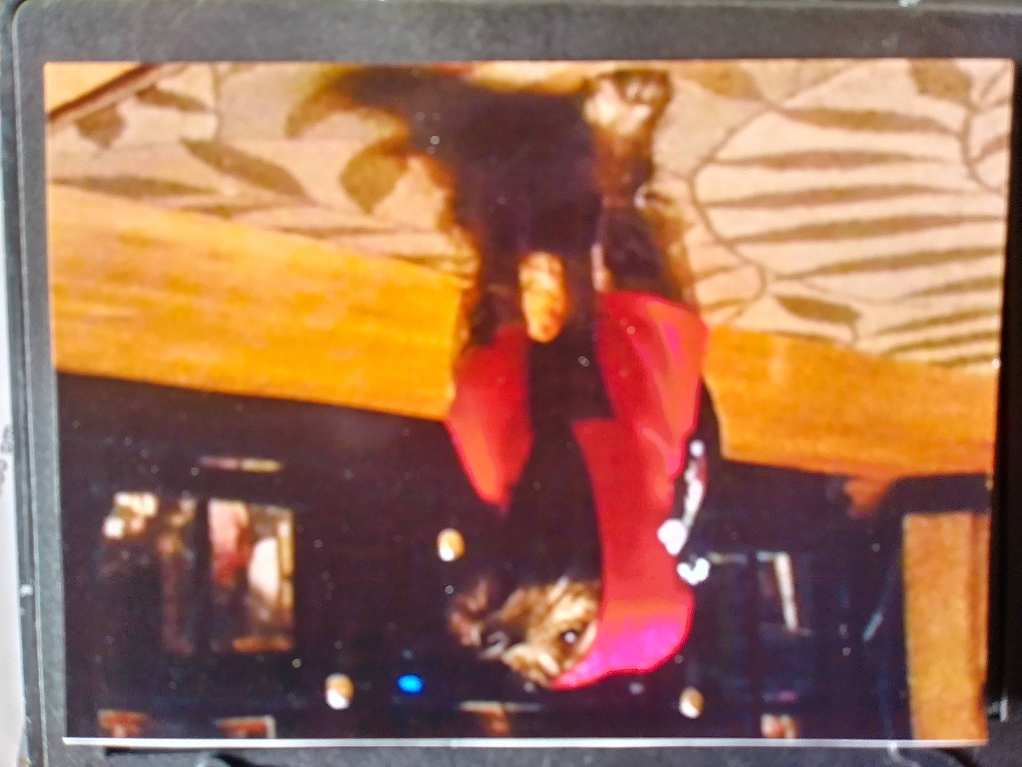 Bentley is registered to the contest to win money with this photo: art, display_device, electronic_device, entertainment, event, flat_panel_display, font, led_backlit_lcd_display, magenta, multimedia, output_device, performing_arts, picture_frame, rectangle, room, technology, television, television_program, television_set, visual_arts