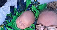 Atlas joined the competition — help win amazing prizes! adult, baby, blanket, blue, casual, closeup, face, family, fleece, glasses, green, happy, lying_down, outdoor, people, portrait, relaxation, sleeping, smile, warmth