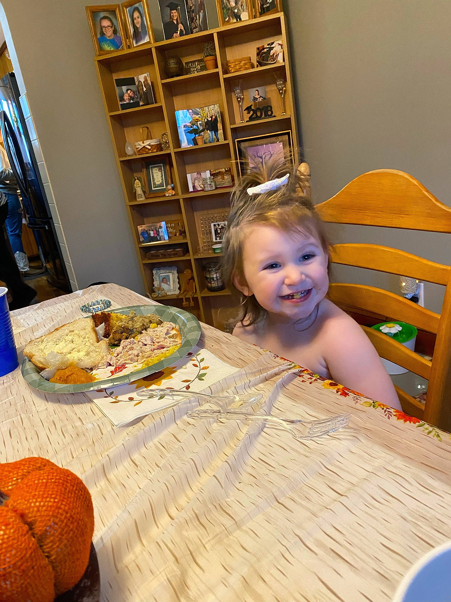 Kali is registered to the contest to win money with this photo: baby, baby_toddler_clothing, blue, calabaza, chair, child, comfort, cucurbita, flooring, furniture, gourd, joy, leisure, person, pumpkin, shelf, table, tableware, toddler, vegetable