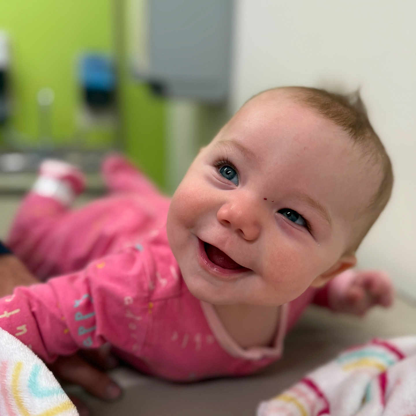 Koa joined the competition — help win amazing prizes! baby, babylaughing, blanket, bodypart, face, finger, hand, happy, head, laughing, mouth, newborn, person, photography, portrait, smile, towel