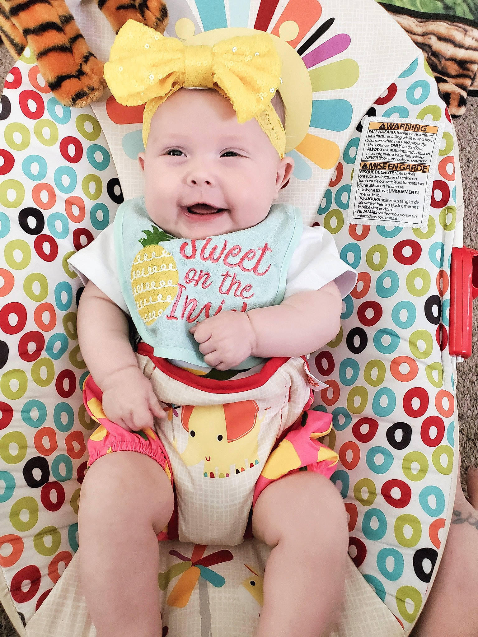 Josephine joined the competition — help win amazing prizes! baby, baby_products, baby_toddler_clothing, child, face, facial_expression, finger, happy, hat, head, headwear, human_leg, pattern, person, pink, sitting, skin, smile, textile, thigh