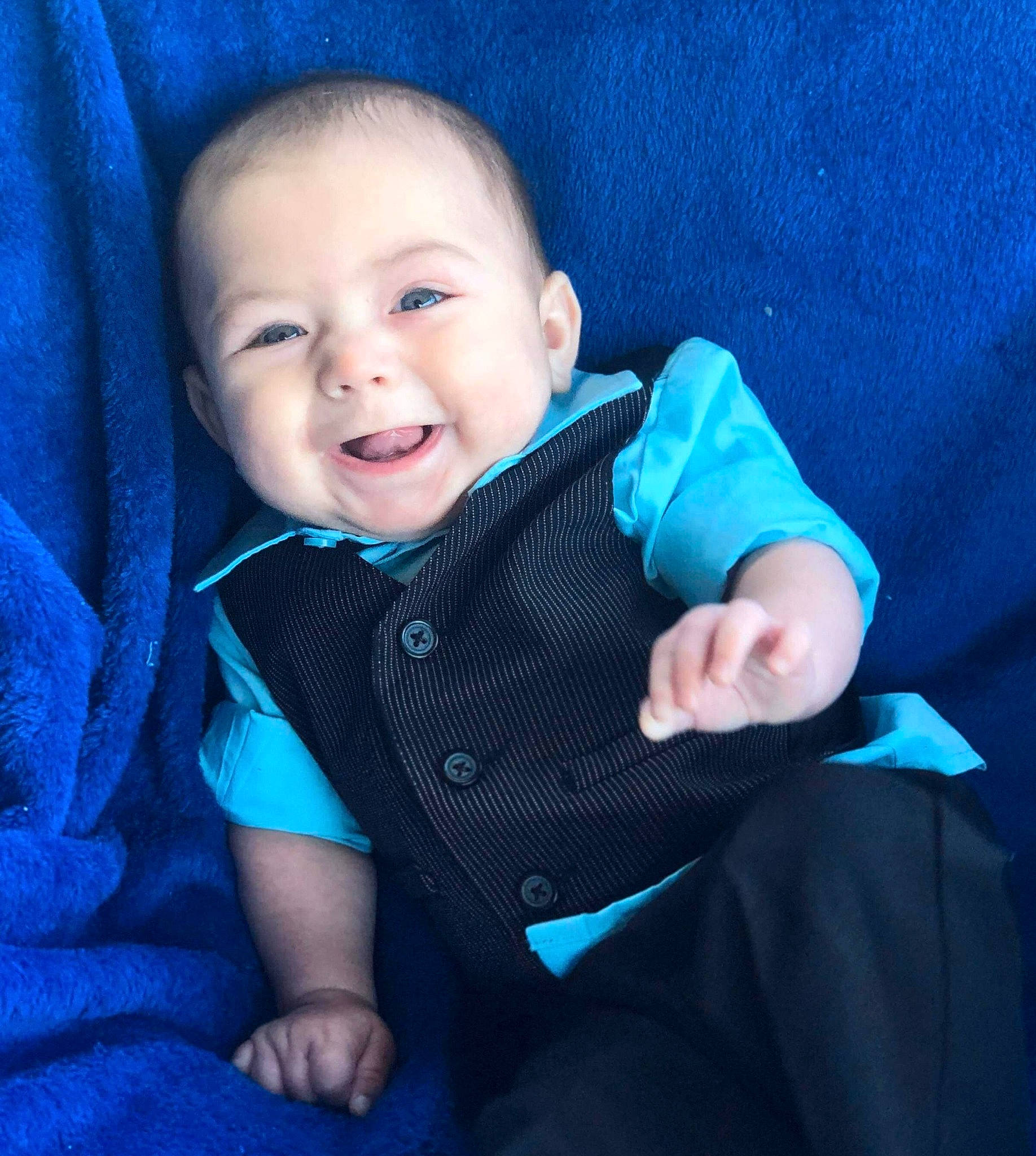 Maddoux joined the competition — help win amazing prizes! azure, baby, blue, cheek, child, chin, eye, face, facial_expression, head, human, lip, nose, people, person, product, sitting, skin, smile, toddler