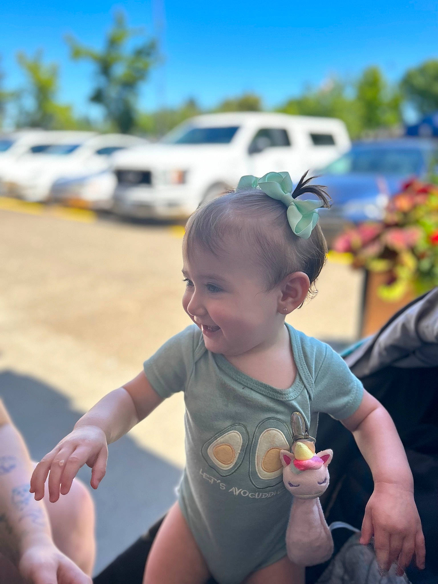 Addison is registered to the contest to win money with this photo: baby, child, event, fun, gesture, grass, happy, head, human_leg, leisure, person, recreation, skin, sky, smile, summer, t_shirt, thigh, thumb, toddler