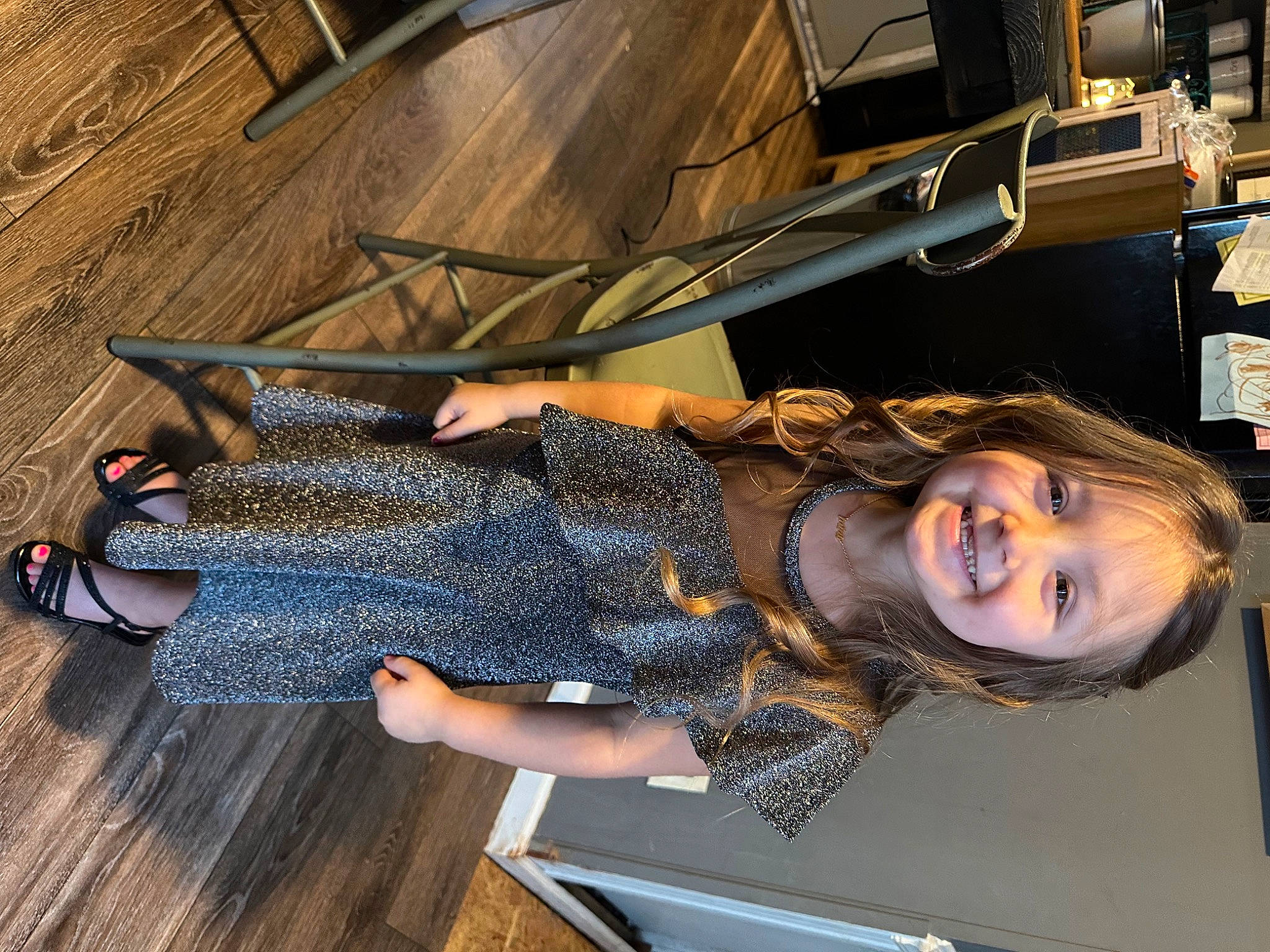 Lindsey is registered to the contest to win money with this photo: automotive_design, automotive_exterior, denim, flash_photography, flooring, fun, hardwood, human_leg, joy, leisure, luxury_vehicle, person, room, sitting, smile, thigh, travel, wood, wood_flooring