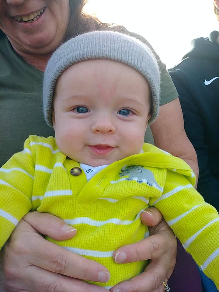 Eli is registered to the contest to win money with this photo: baby, baby_products, child, finger, hand, person, product, skin, smile, thumb, toddler, yellow