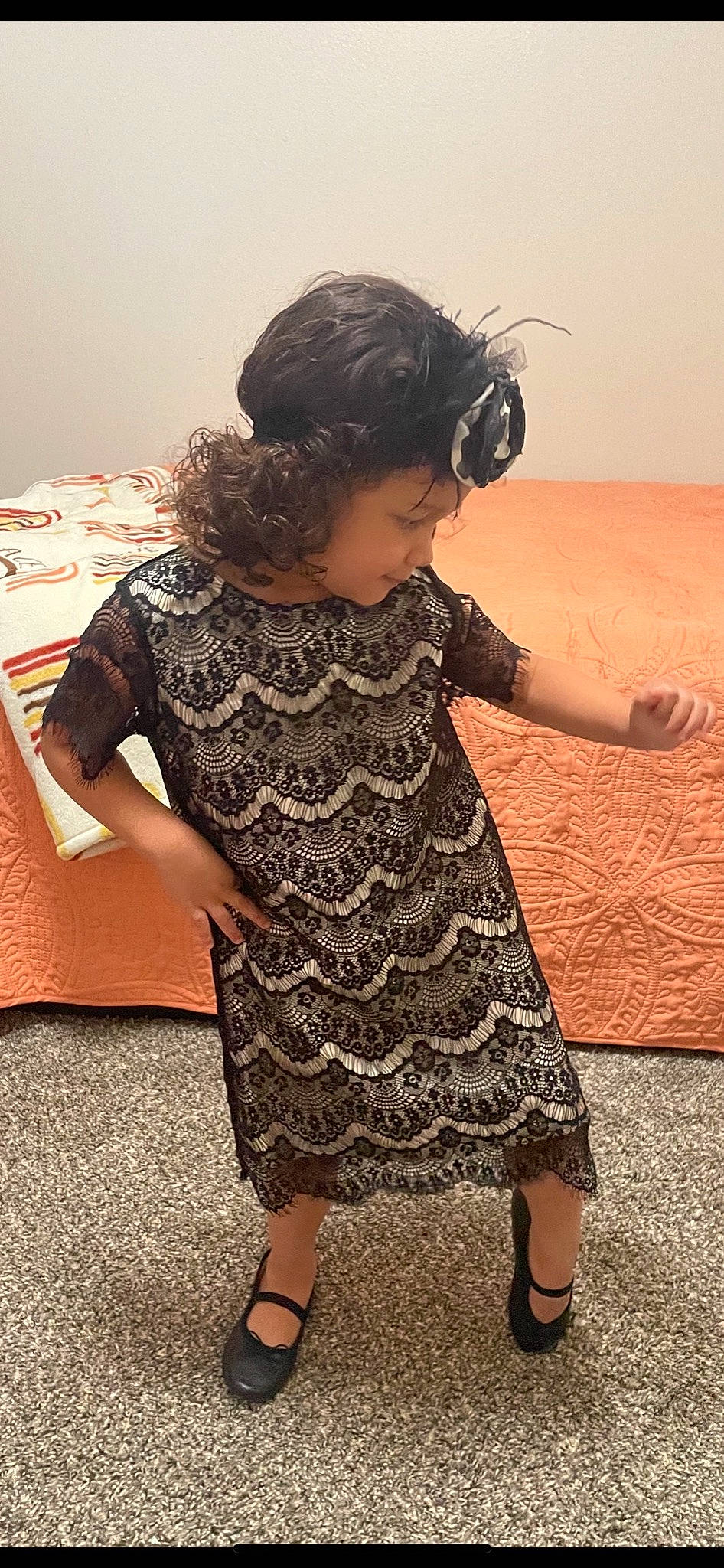 Hollyn is registered to the contest to win money with this photo: adaptation, child, day_dress, dress, fashion_design, flooring, fun, gesture, hairstyle, happy, human_leg, joint, leg, one_piece_garment, pattern, person, sandal, shoulder, skin, sleeve