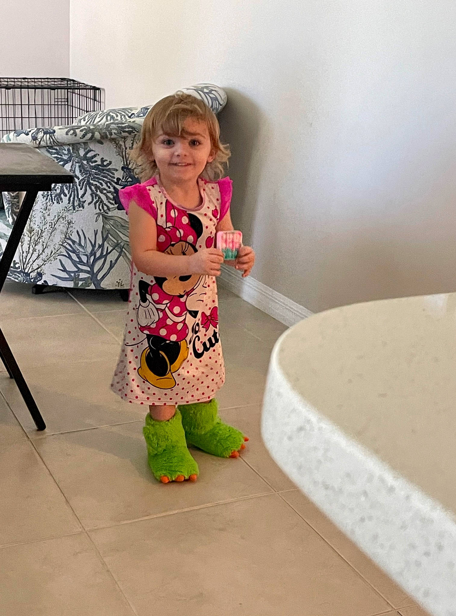 Ridley is registered to the contest to win money with this photo: baby_toddler_clothing, child, fashion_design, floor, flooring, hair, human_leg, joint, joy, knee, leg, pattern, person, room, sandal, sitting, skin, sleeve, sock, standing