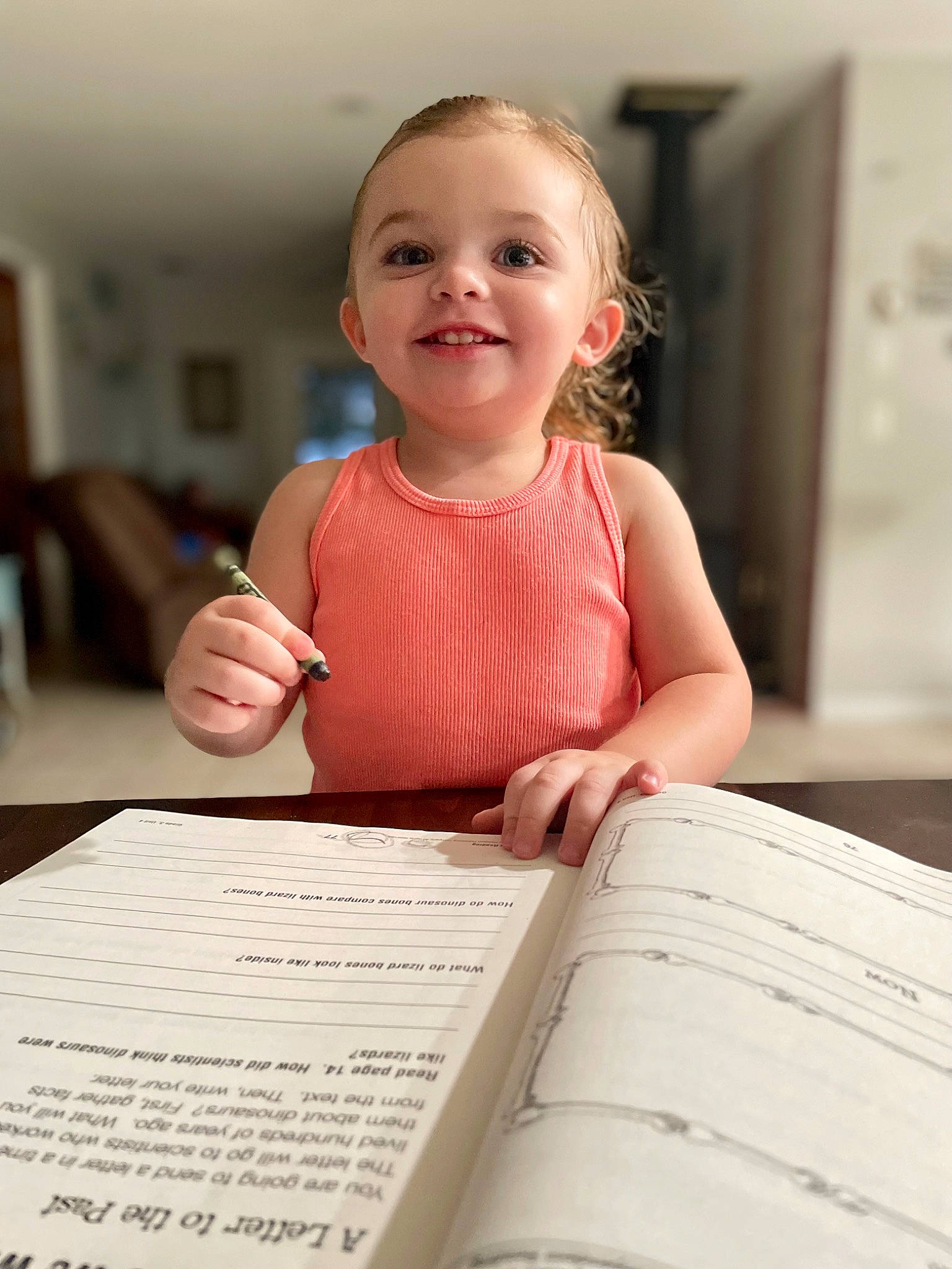 Ridley joined the competition — help win amazing prizes! baby_toddler_clothing, book, chair, child, dress, flooring, font, happy, joy, office_supplies, paper, person, publication, room, sitting, smile, snapshot, table, toddler, wood