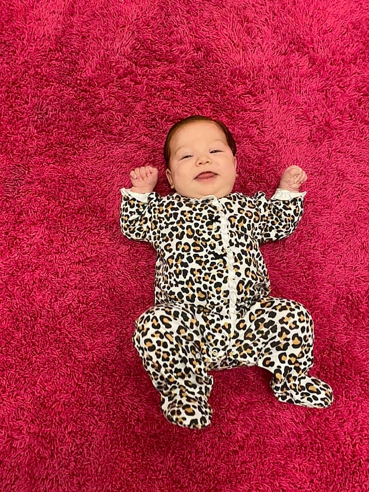 Jenna joined the competition — help win amazing prizes! baby, baby_toddler_clothing, child, pattern, person, pink, red, smile, toddler