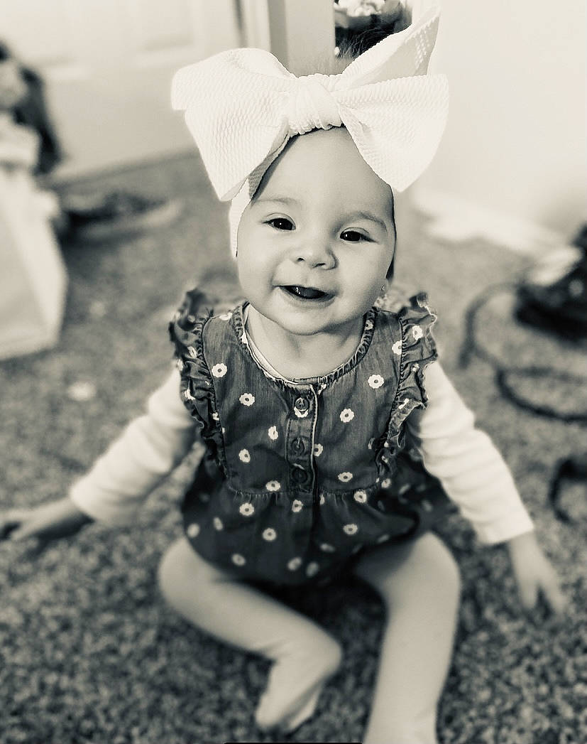 Paizlee is registered to the contest to win money with this photo: baby_toddler_clothing, black_and_white, facial_expression, flash_photography, gesture, grass, happy, hat, headgear, human_body, iris, mammal, people_in_nature, person, skin, smile, standing, style, toddler, vertebrate