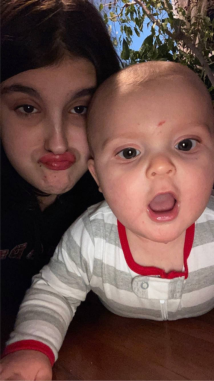 Christopher is registered to the contest to win money with this photo: baby, baby_toddler_clothing, cheek, cool, eye, eyebrow, eyelash, forehead, fun, gesture, grass, happy, iris, lip, mouth, nose, person, plant, skin, smile