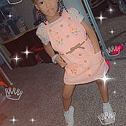 Indiyah is registered to the contest to win money with this photo: child, girl, standing, pink_dress, braided_hair, carpet, mirror, indoor, shoes, sparkle_effect, crown_sticker, casual, posing, smiling, young, fashion, room, reflection, playful, cute