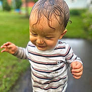 Gabriel joined the competition — help win amazing prizes! child, toddler, wet_hair, striped_shirt, dirt, outdoor, garden, greenery, path, exploring, happy, cute, nature, person, smiling, dirty_hands, fun, playful, casual_clothing, daylight