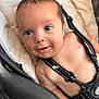 Yariel is registered to the contest to win money with this photo: baby, infant, face, blue_eyes, smile, car_seat, straps, skin, closeup, cute, child, seatbelt, comfort, young, person, human, baby_boy, expression, indoors, portrait