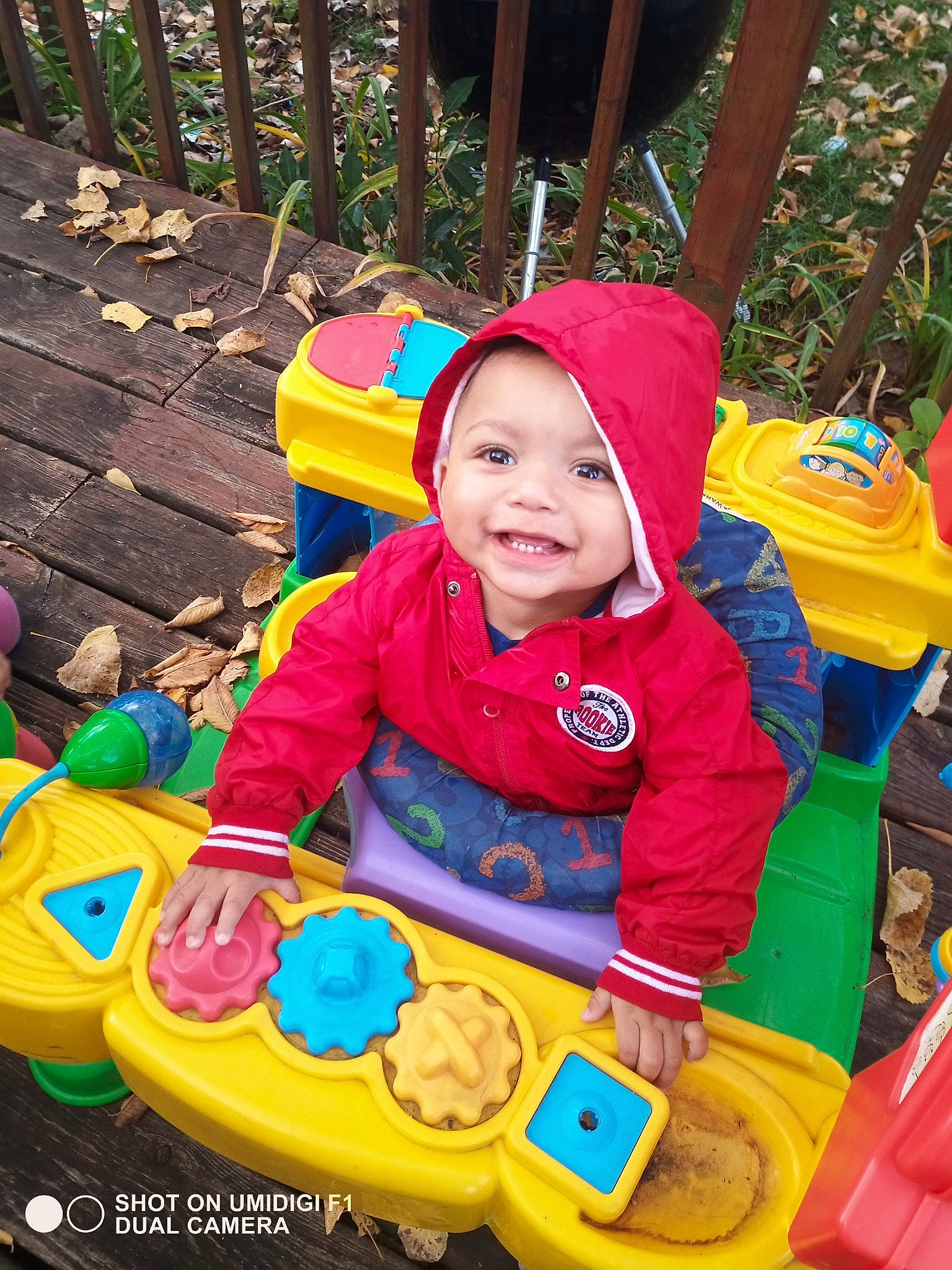 La'Shon joined the competition — help win amazing prizes! baby, baby_products, baby_toddler_clothing, child, city, fun, grass, green, happy, headwear, jacket, joy, leisure, person, play, product, recreation, sharing, sitting, smile