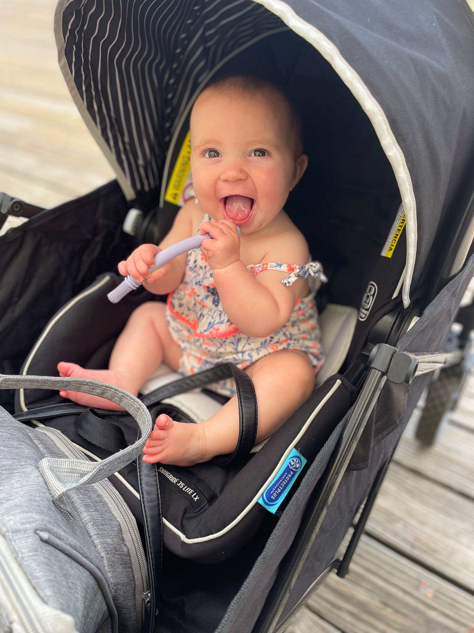 Ryleigh is registered to the contest to win money with this photo: baby, baby_carriage, baby_products, baby_safety, chair, child, comfort, event, eye, fashion_accessory, fun, lap, leisure, person, product, recreation, sitting, smile, toddler, travel