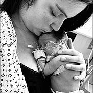 Laramie joined the competition — help win amazing prizes! mother, baby, newborn, premature_baby, hospital, medical_tubes, oxygen_mask, love, care, embrace, black_and_white, portrait, skin, hand, face, tenderness, intimacy, person, fragile, closeup