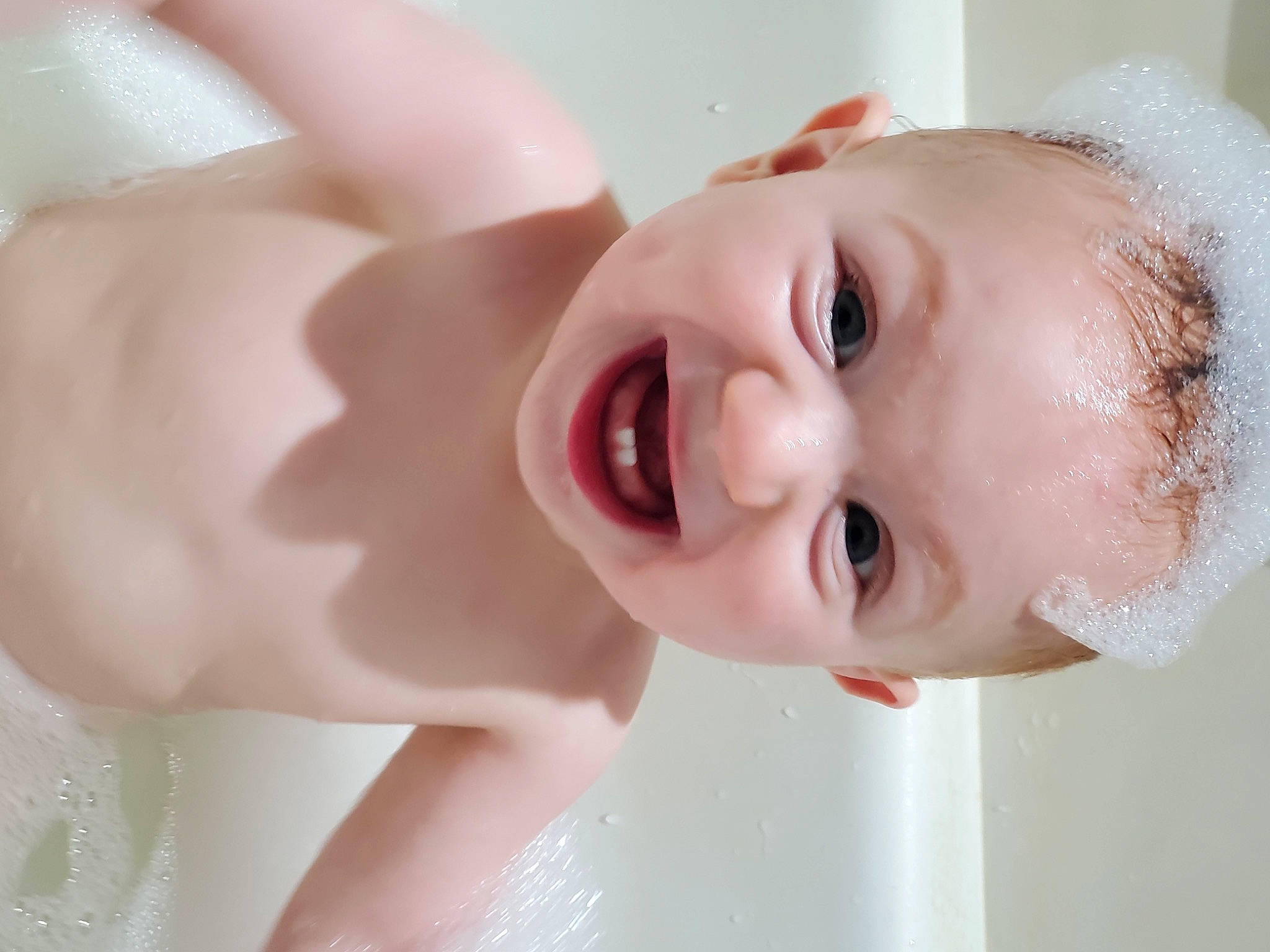 Case is registered to the contest to win money with this photo: baby, baby_bathing, bathing, bathtub, beauty, cheek, child, chin, eye, face, facial_expression, happy, head, lip, mouth, neck, nose, person, skin, smile