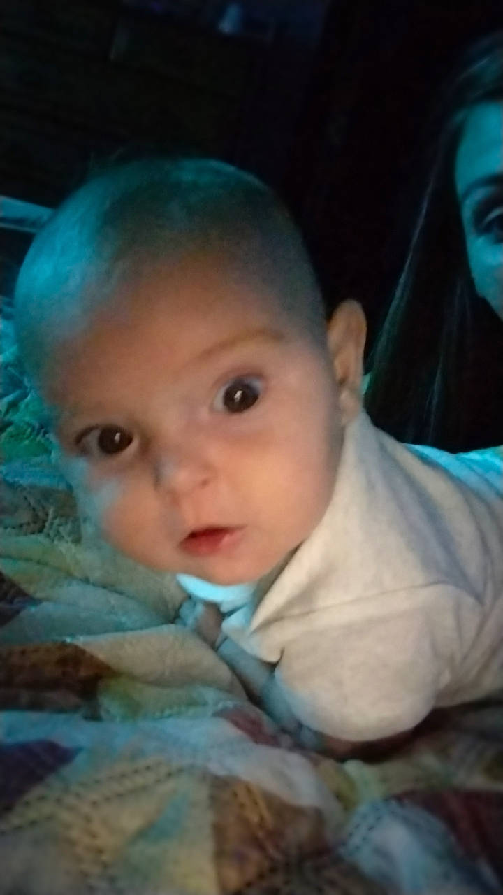 Emory is registered to the contest to win money with this photo: baby, baby_toddler_clothing, cheek, chin, comfort, eye, eyebrow, finger, flash_photography, forehead, fun, happy, human_body, iris, lip, mouth, nose, person, skin, smile