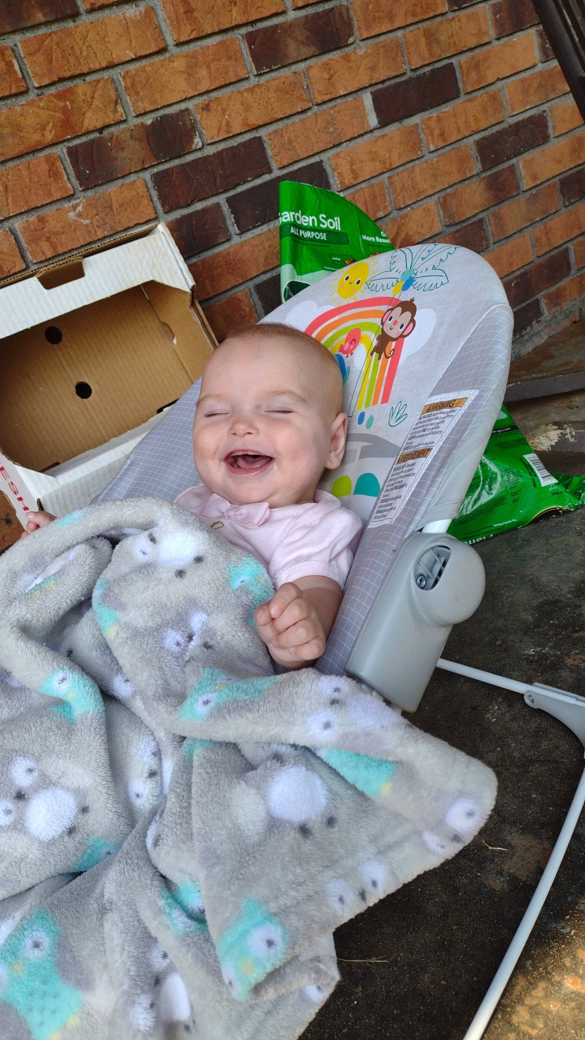 Emory is registered to the contest to win money with this photo: baby, baby_products, baby_toddler_clothing, baby_toys, child, fun, green, happy, joy, linens, person, plastic, play, plush, room, sitting, smile, stuffed_toy, teddy_bear, toddler