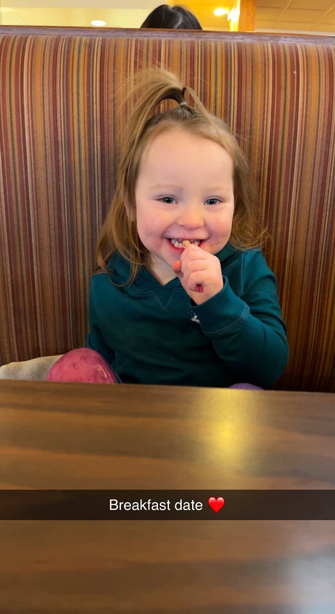 Thea is registered to the contest to win money with this photo: baby_toddler_clothing, blond, cheek, child, curtain, face, finger, flash_photography, fun, hair, happy, head, iris, joy, laugh, person, room, sitting, smile, standing