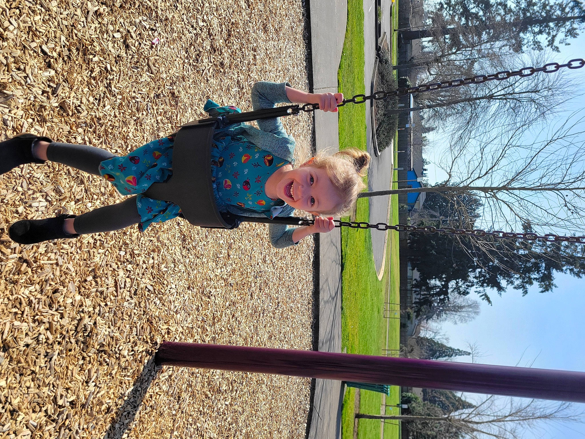 Emma is registered to the contest to win money with this photo: baby, child, city, electric_blue, fun, joy, leisure, people_in_nature, person, plant, pole, recreation, shadow, sky, toddler, tree, trunk, wood