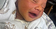 Freya is registered to the contest to win money with this photo: adorable, baby, blanket, child, closeup, clothing, cozy, cute, cute_baby, face, indoors, infant, newborn, peaceful, portrait, resting, sleeping, smiling, soft, wrapped