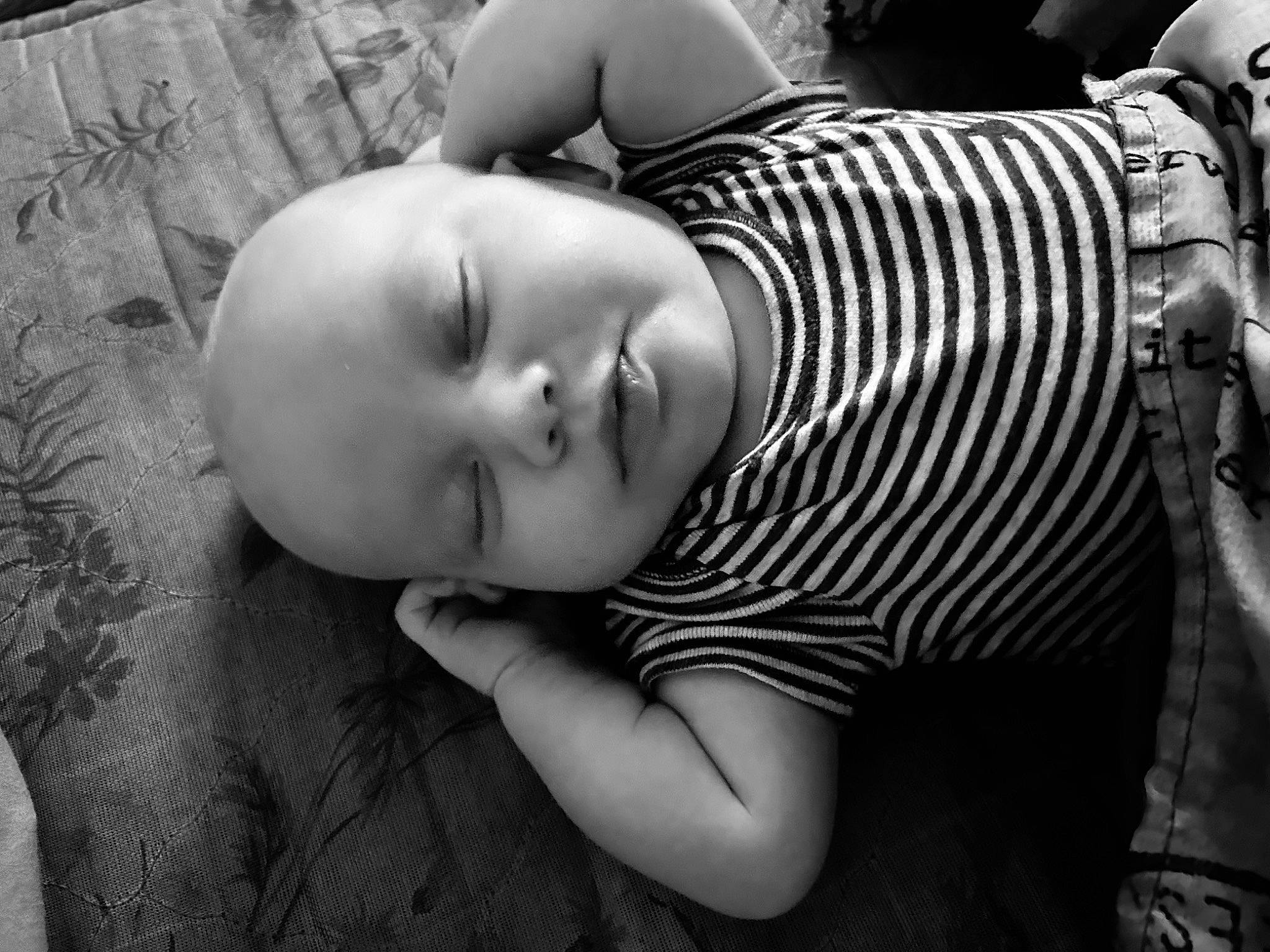 Payden is registered to the contest to win money with this photo: baby, beauty, black, black_and_white, child, comfort, flash_photography, grass, happy, human_leg, monochrome, monochrome_photography, pattern, person, sitting, skin, stock_photography, style, toddler, tree