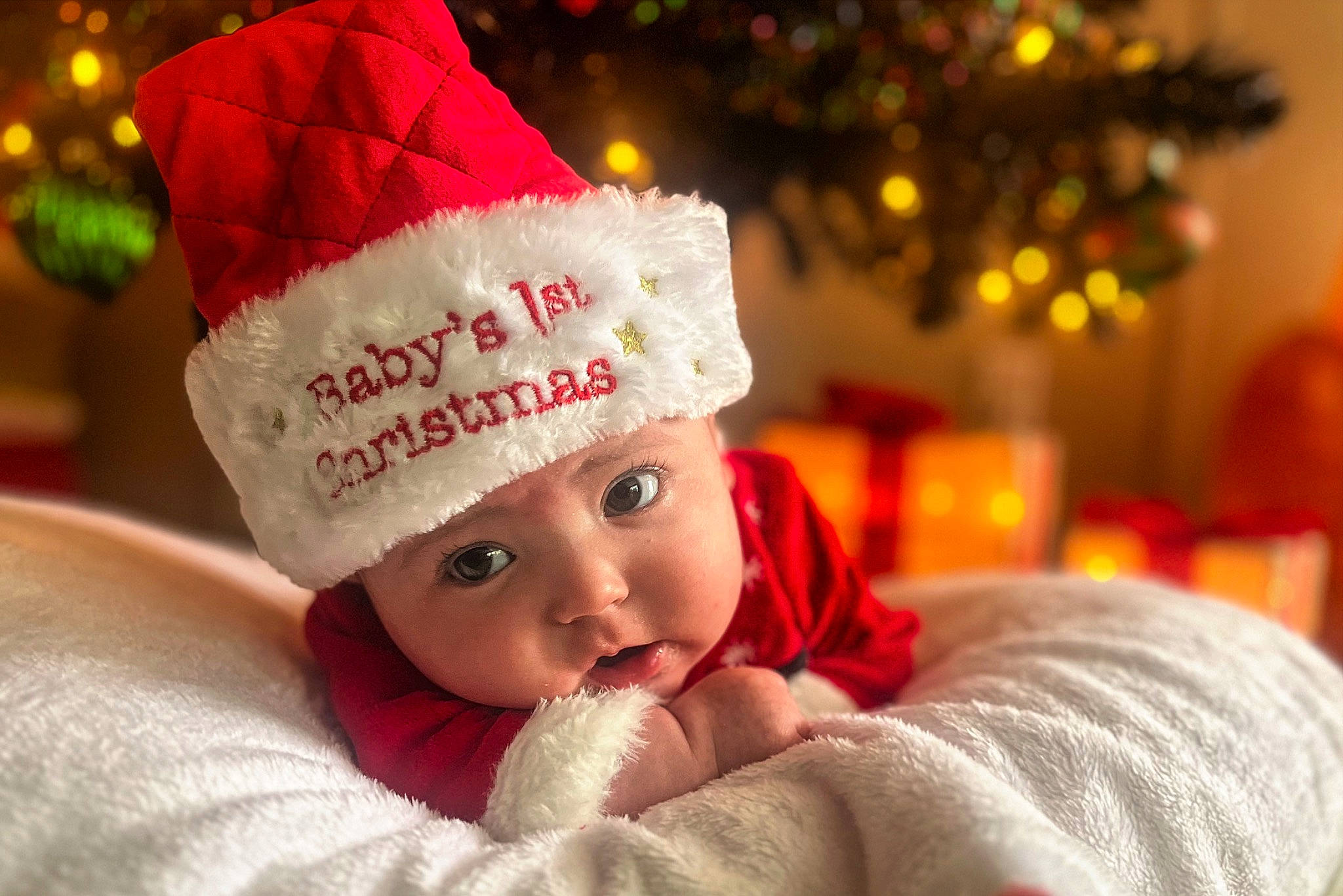 Saylor is registered to the contest to win money with this photo: baby, baby_sleeping, cap, child, christmas_decoration, christmas_eve, christmas_ornament, comfort, costume_hat, event, fur, happy, headgear, headwear, holiday, interior_design, knit_cap, linens, ornament, person