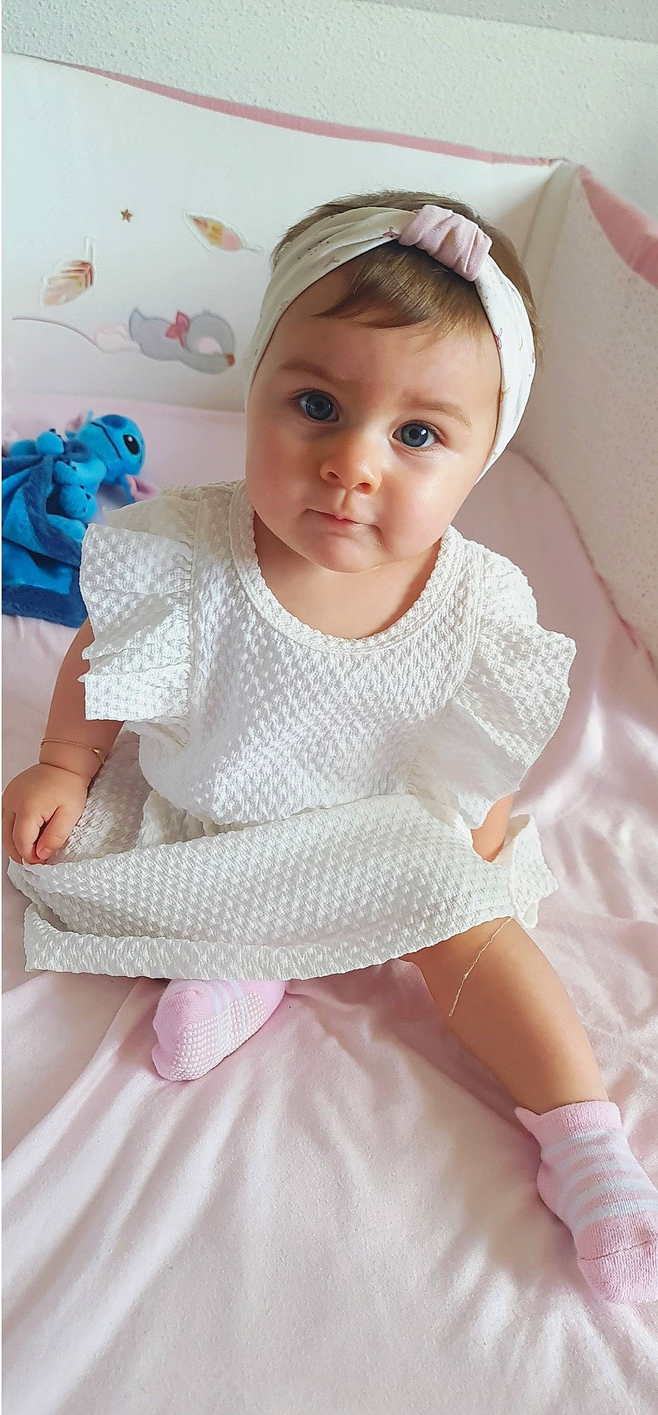Giuliana participe au concours pour gagner de l'argent avec cette photo : baby, baby_toddler_clothing, cheek, child, collar, eyebrow, eyelash, face, finger, hairstyle, head, headgear, iris, lip, neck, person, pink, skin, sleeve, toddler