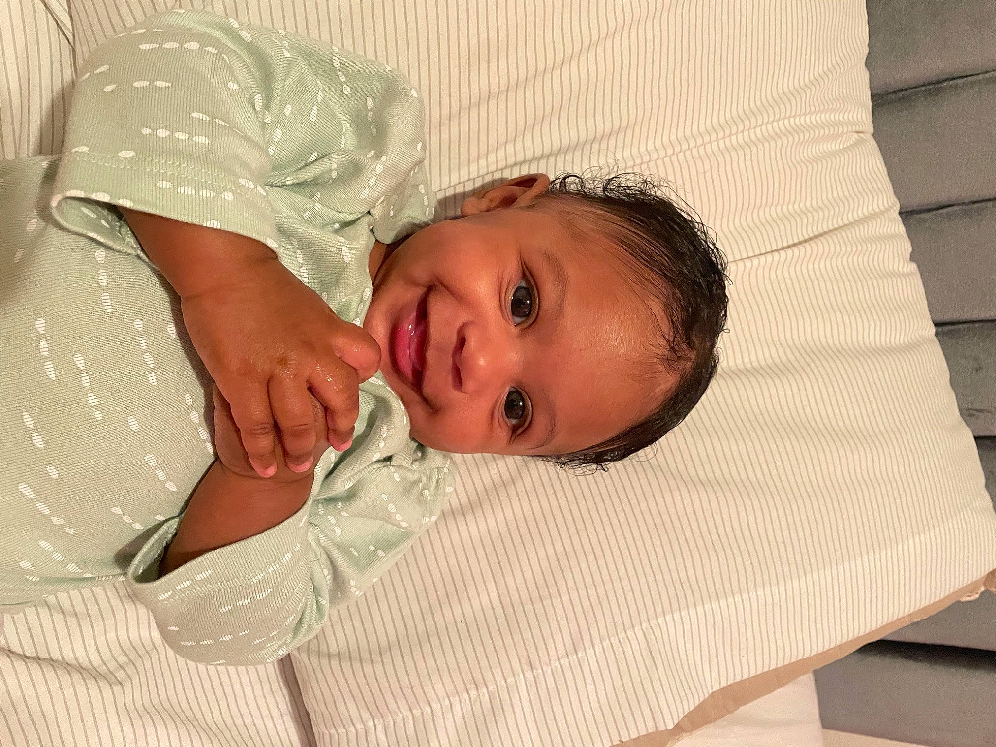 Amarie joined the competition — help win amazing prizes! baby, baby_toddler_clothing, bed, bedding, child, comfort, eye, eyebrow, face, flooring, happy, joy, linens, lip, mouth, nose, person, room, skin, sleeve