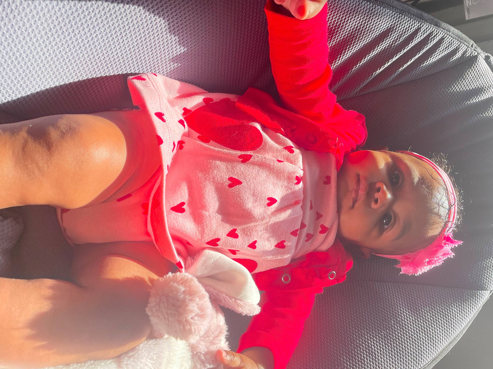 Amarie is registered to the contest to win money with this photo: arm, baby, baby_toddler_clothing, beauty, brassiere, comfort, elbow, facial_expression, finger, fun, hand, knee, leg, magenta, mouth, muscle, person, pink, red, thigh