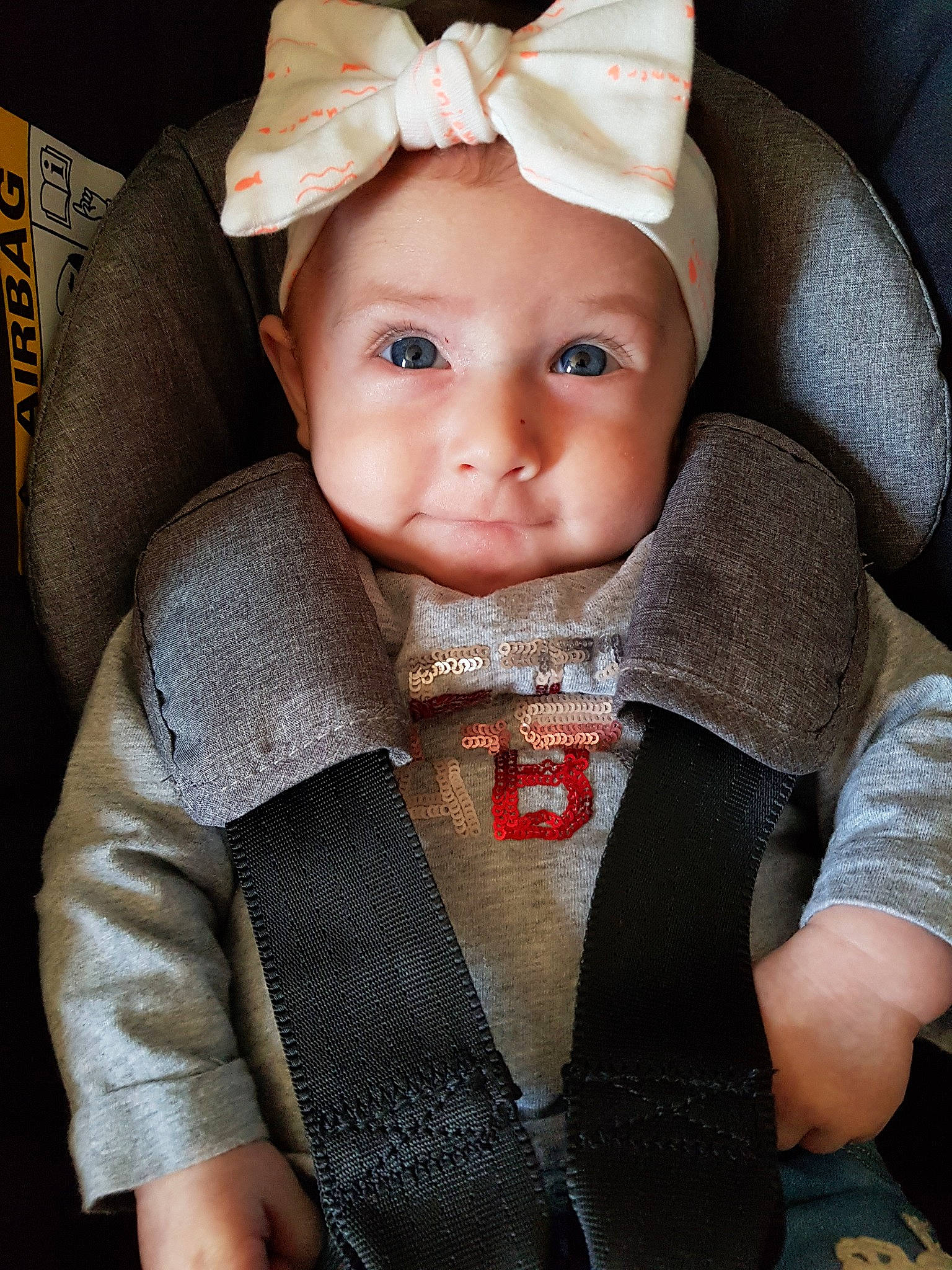 Crystal participe au concours pour gagner de l'argent avec cette photo : baby, car_seat, cheek, child, child_model, chin, ear, eye, face, fashion_accessory, hair_accessory, head, headwear, iris, lip, neck, nose, organ, person, product