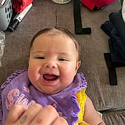 Dora joined the competition — help win amazing prizes! architecture, baby, babylaughing, bodypart, building, couch, face, finger, furniture, hand, happy, head, indoors, laughing, livingroom, person, photography, portrait, room, smile