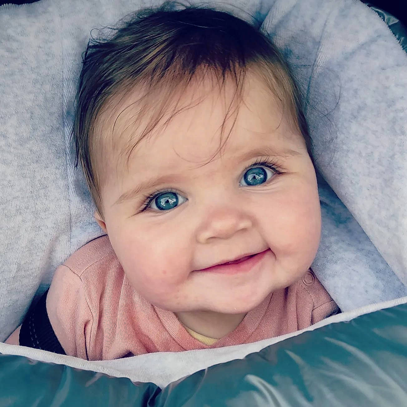 Violeta participe au concours pour gagner de l'argent avec cette photo : azure, baby, cheek, chin, ear, eye, eyebrow, eyelash, flash_photography, happy, head, iris, lip, mouth, nose, organ, outerwear, person, skin, sleeve