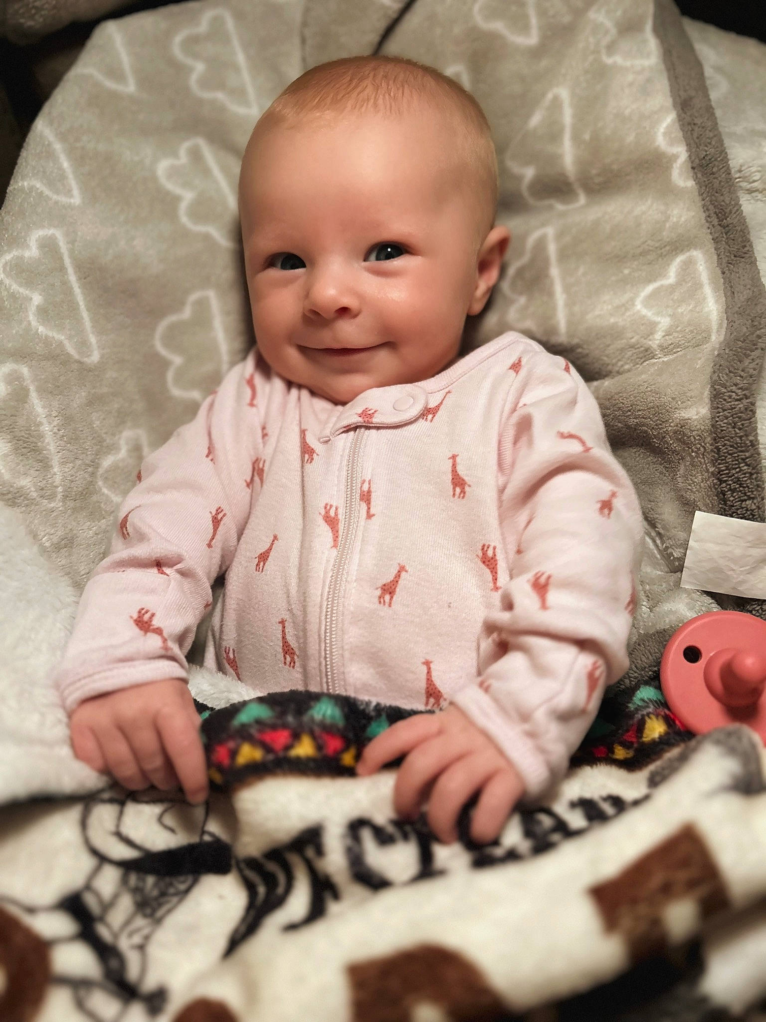 Hazelynn is registered to the contest to win money with this photo: baby, baby_toddler_clothing, cheek, comfort, dress, facial_expression, finger, flooring, human, joy, mammal, mouth, orange, organ, people, person, product, skin, sleeve, smile