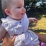 baby, baby_girl, child, cute, dress, face, hand, happy, holding, infant, nature, outdoor, person, portrait, skin, smiling, striped_clothing, summer, sunlight, trees