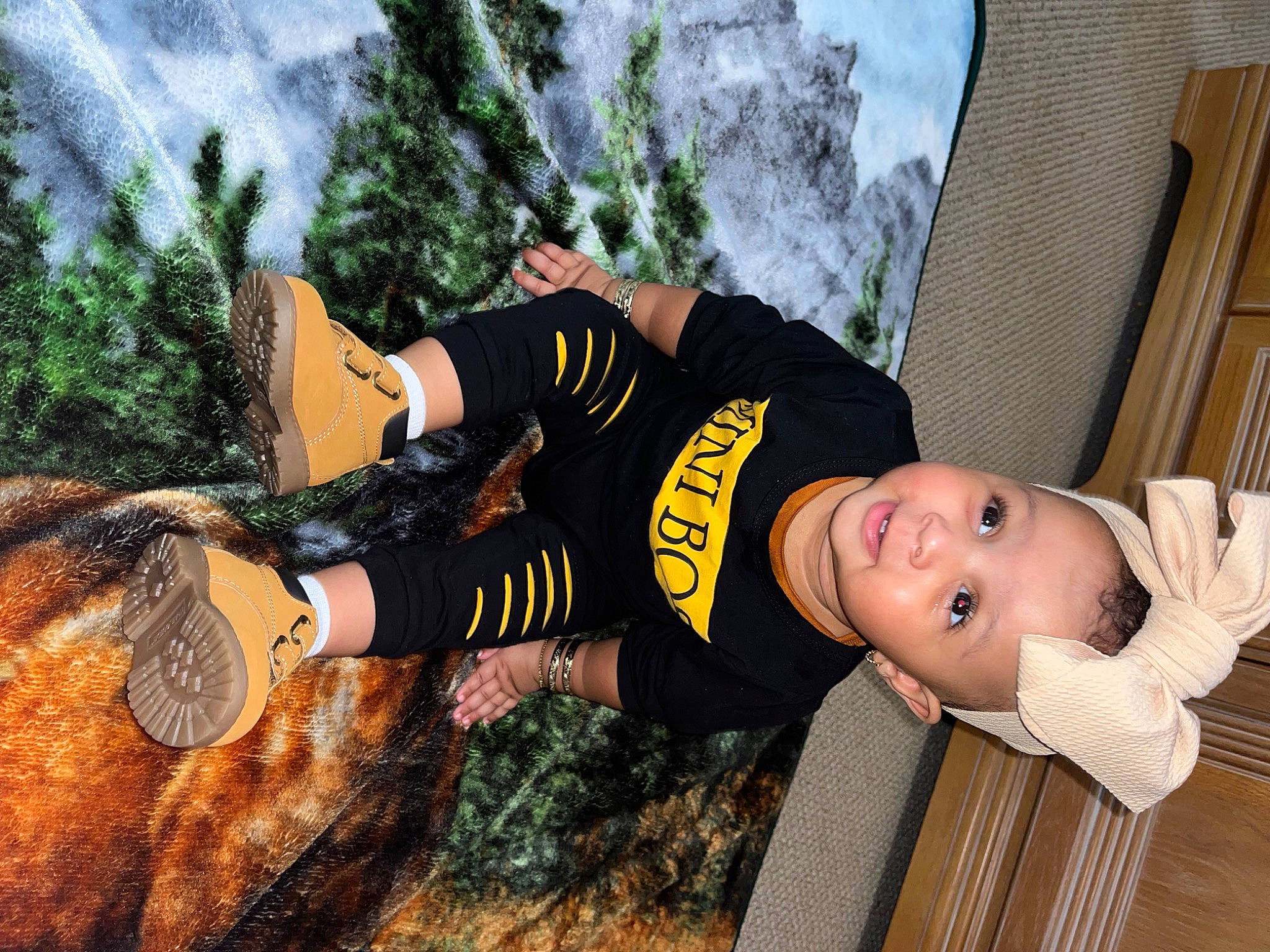 Jaylah is registered to the contest to win money with this photo: baby, child, costume, flash_photography, forest, fun, glasses, grass, happy, human_body, leisure, person, personal_protective_equipment, plant, soil, sportswear, t_shirt, thigh, toddler, tree