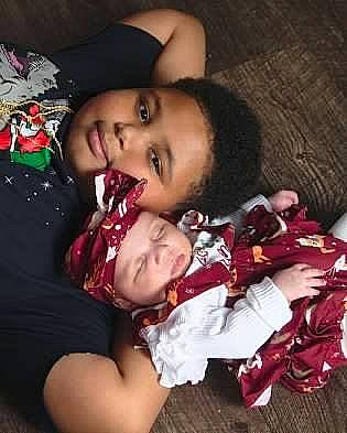 Jaydin is registered to the contest to win money with this photo: arm, baby, black_hair, carmine, child, cool, event, flash_photography, fun, hand, happy, headwear, lip, love, mouth, nose, person, selfie, smile, t_shirt