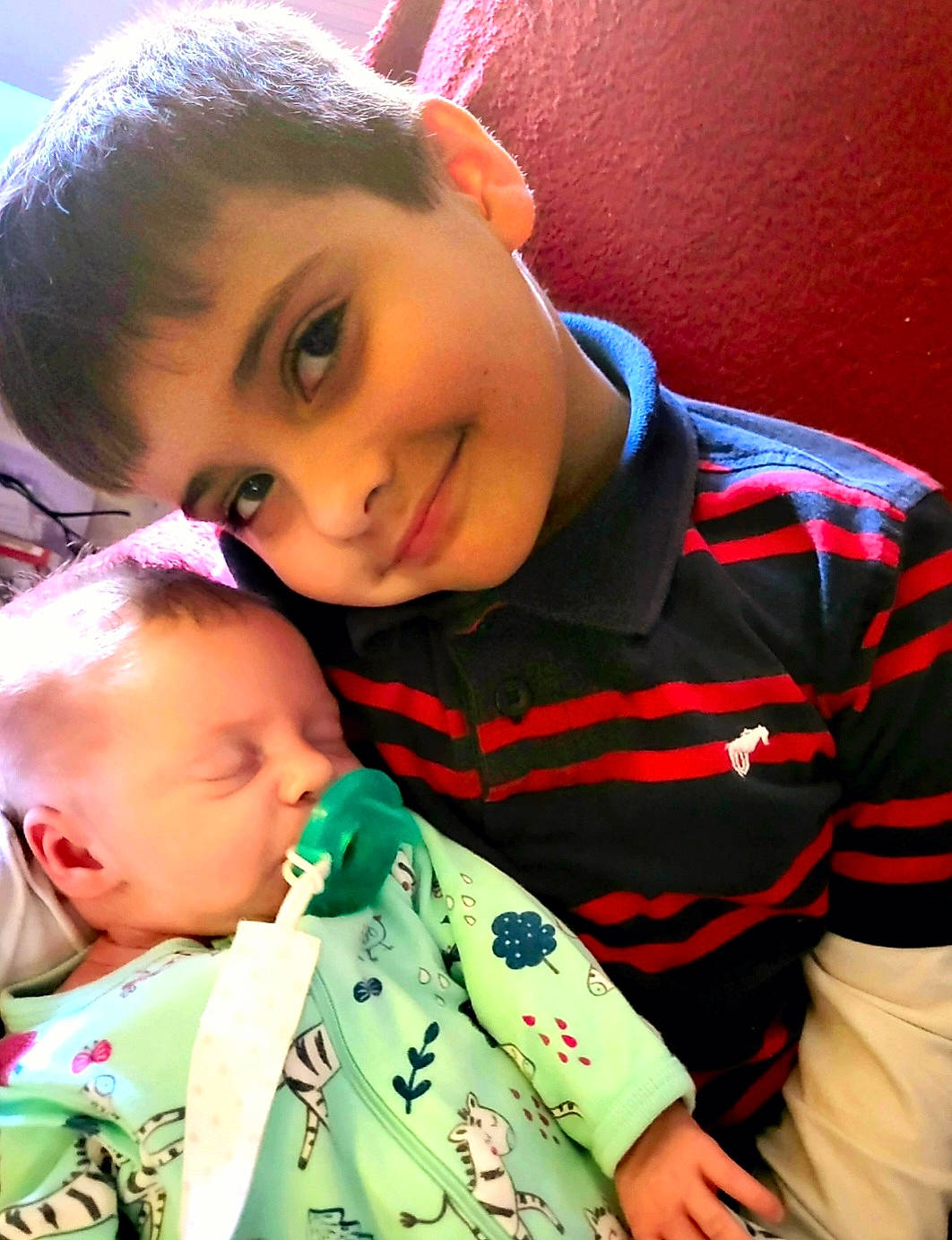 Bentley joined the competition — help win amazing prizes! black_hair, cheek, chin, eye, finger, forehead, happy, human, human_body, iris, joy, lip, mammal, mouth, nose, people, person, skin, sleeve, smile