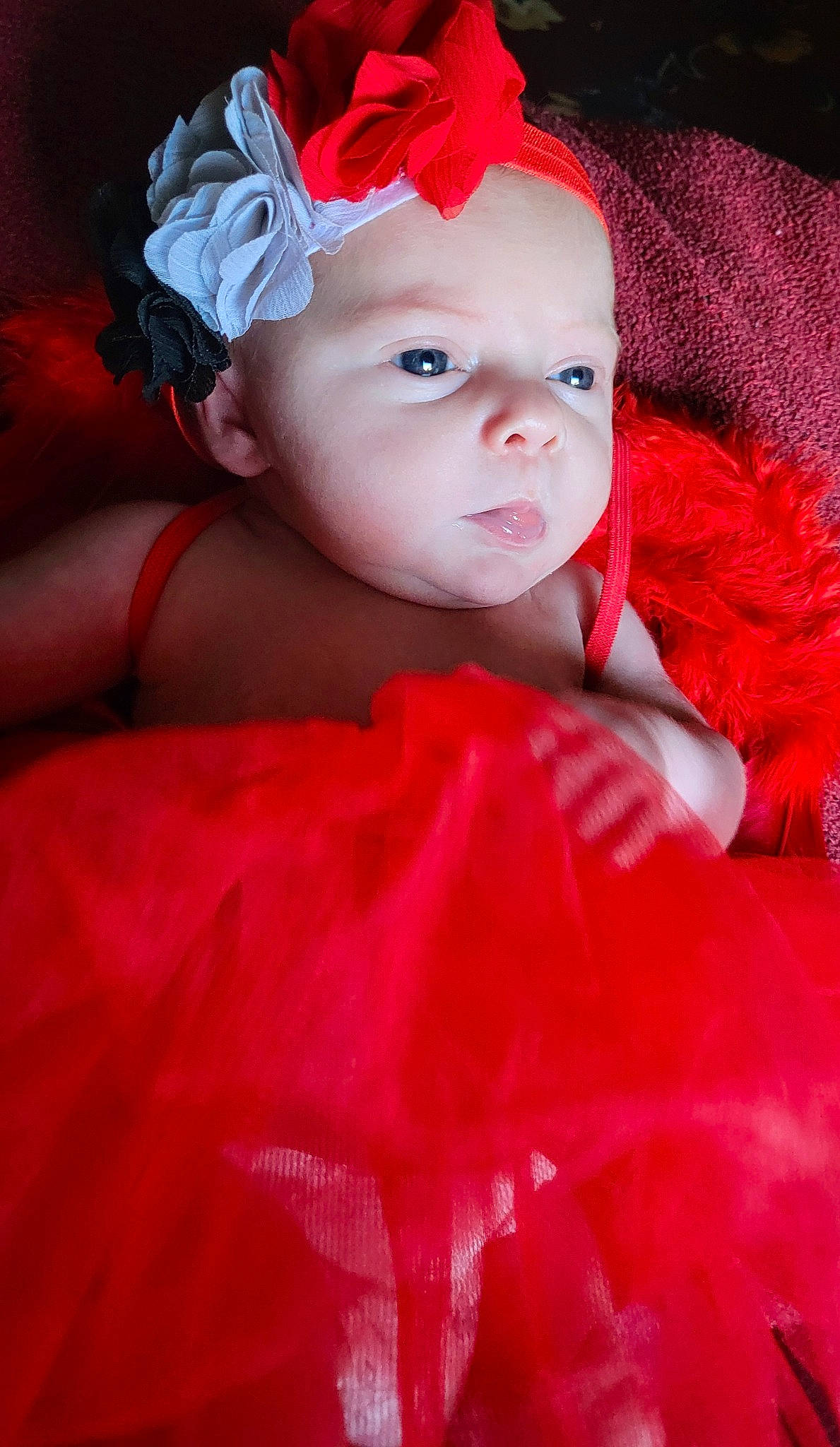 Hazel is registered to the contest to win money with this photo: baby, baby_toddler_clothing, cap, child, chin, costume_hat, dress, event, fashion_accessory, flash_photography, headband, headpiece, iris, lip, magenta, person, pink, red, skin, sleeve