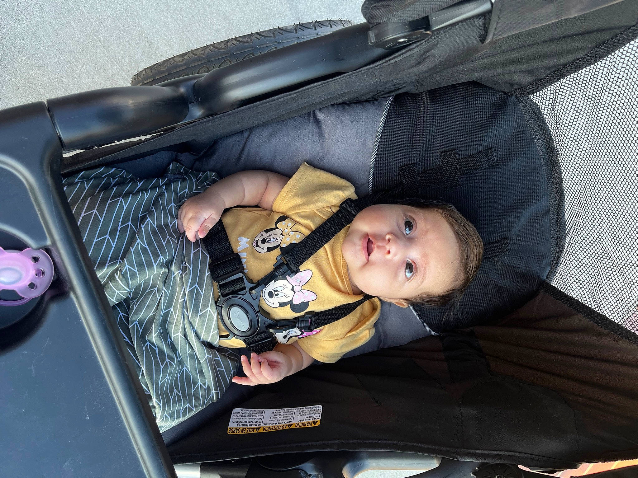 Ella is registered to the contest to win money with this photo: auto_part, automotive_design, automotive_exterior, automotive_lighting, automotive_tire, automotive_wheel_system, baby, bumper, car, car_seat, family_car, hood, luxury_vehicle, motor_vehicle, person, smile, toddler, trunk, vehicle, vehicle_door