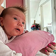 Ivy-Mae joined the competition — help win amazing prizes! baby, casual, clothing, curiosity, doorway, expression, face, furniture, hair, hand, holding, indoor, light, nail_polish, person, pile_of_clothes, pillow, pink, room, skin