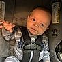 Kaine joined the competition — help win amazing prizes! baby, car_seat, child, infant, stripes, onesie, safety_harness, graco, hand, face, expression, seatbelt, fabric, warning_label, closeup, indoor, cute, wearing, portrait, young