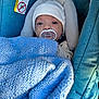 baby, blanket, blue, car_seat, child, clothing, comfort, cozy, cute, fabric, hat, infant, knitted_blanket, newborn, pacifier, portrait, resting, seat_belt, warning_label, white