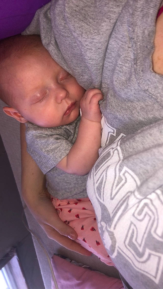 Daisy is registered to the contest to win money with this photo: arm, baby, baby_toddler_clothing, bedtime, cheek, child, comfort, elbow, eye, finger, gesture, human_body, lip, mouth, nose, person, skin, sleeve, thumb, toddler