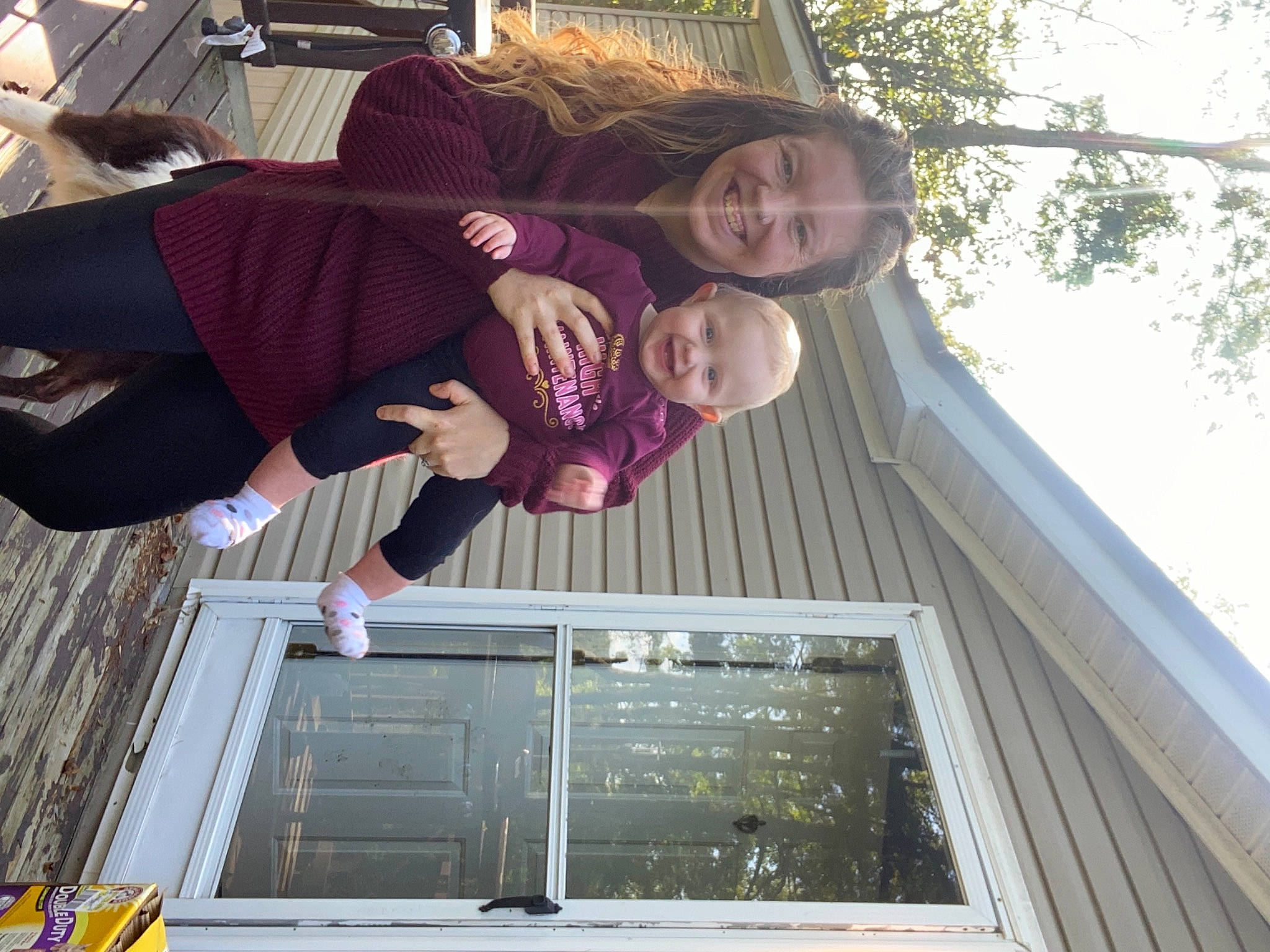 Daisy is registered to the contest to win money with this photo: fun, happy, joy, leisure, magenta, person, plant, smile, thigh, tints_and_shades, tree, window