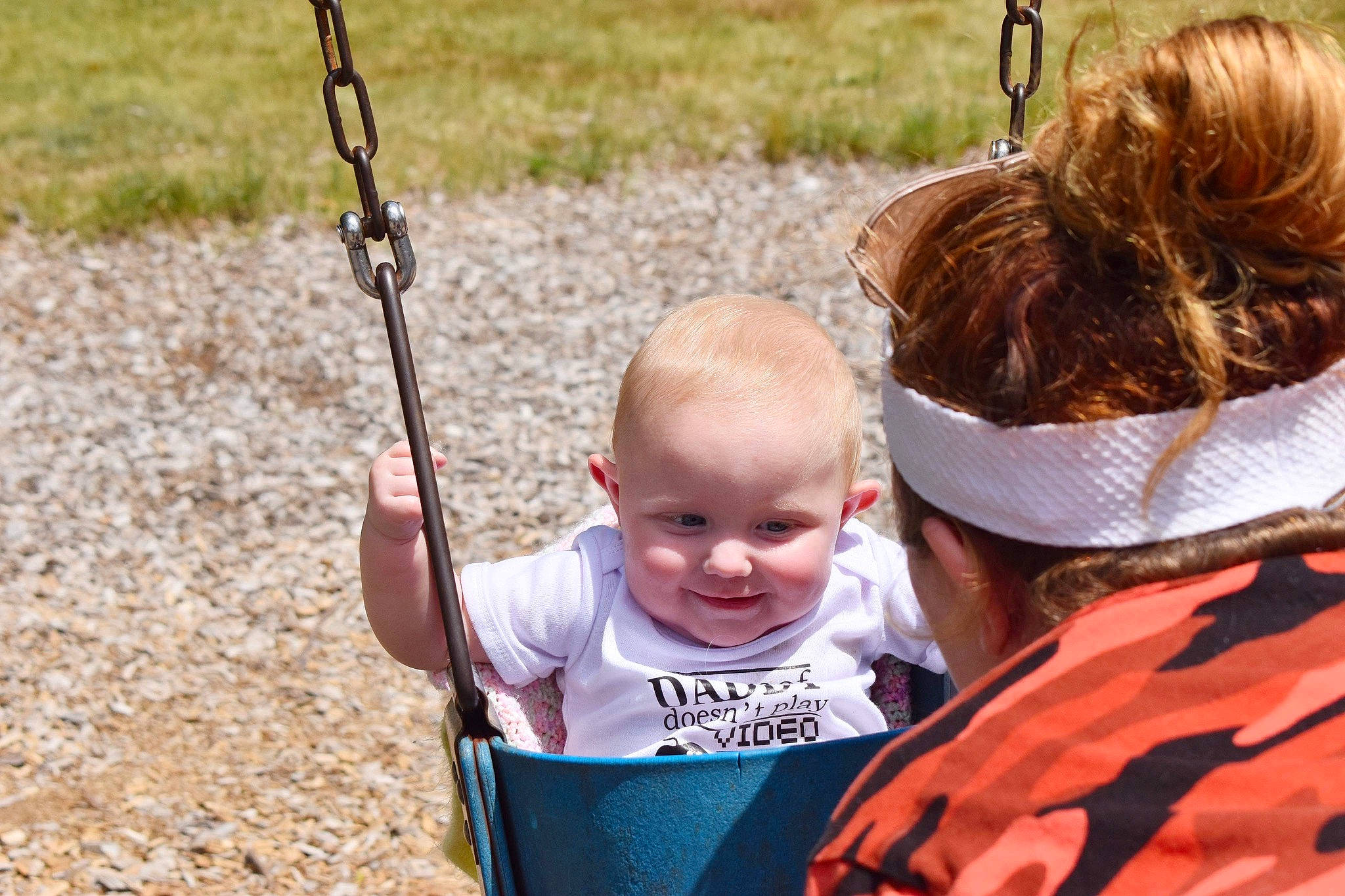 Daisy joined the competition — help win amazing prizes! baby, baby_toddler_clothing, child, city, eye, fun, grass, happy, joy, leaf, leisure, outdoor_play_equipment, people_in_nature, person, photograph, playground, recreation, sitting, spring, swing